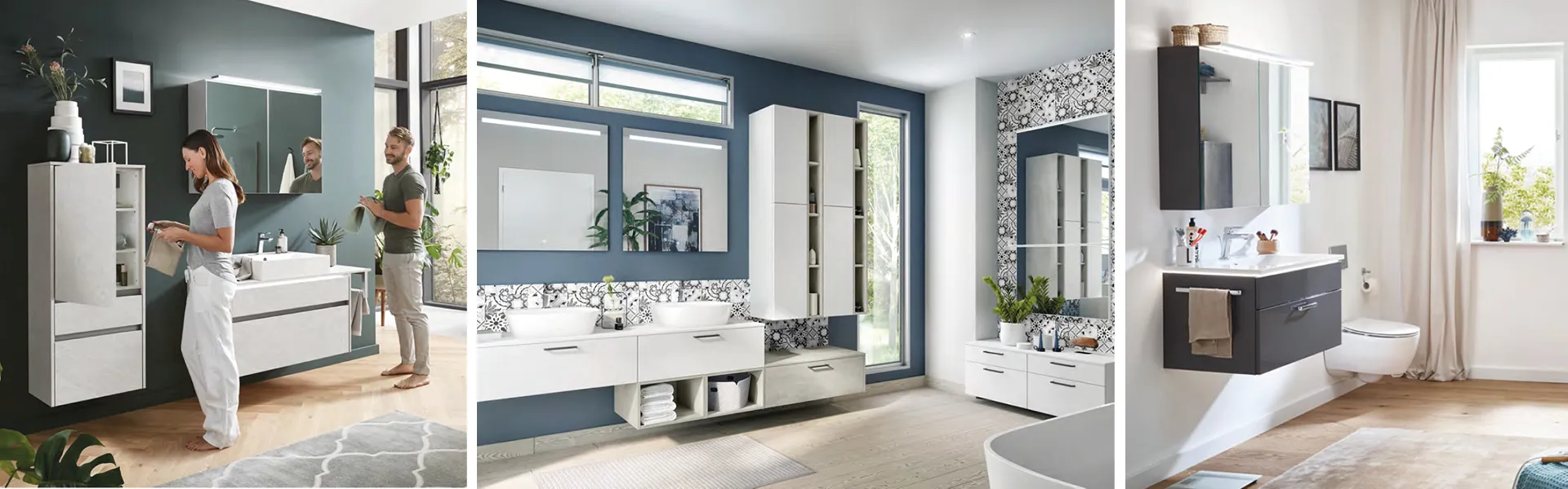 Frau und Mann im modernen Badezimmer mit grüner Wand und weißen Badmöbeln mit Spiegelschrank; helles freundliches Badezimmer in Weiß und Blau, modernes Badezimmer mit Spiegelschrank