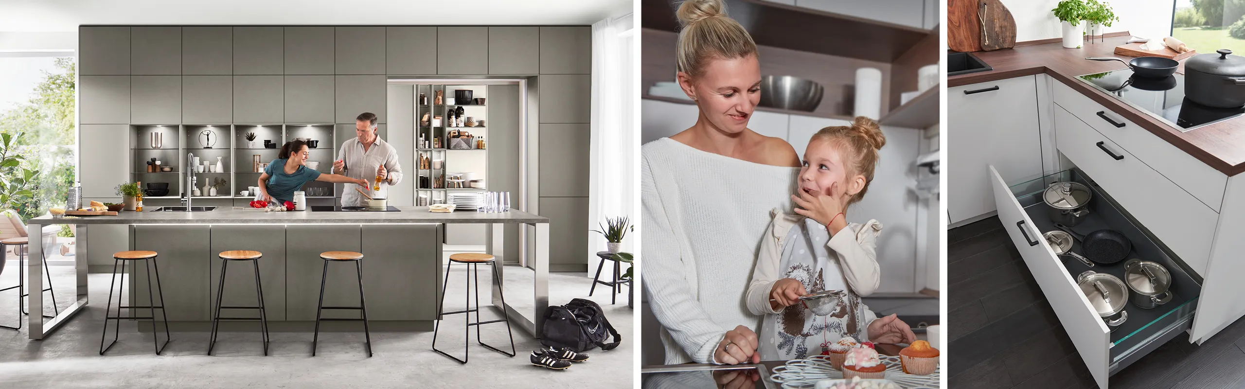 Paar in moderner grauer Inselküche mit Barhockern, Frau mit Kleinkind in Küche und Küchenschublade mit Töpfen
