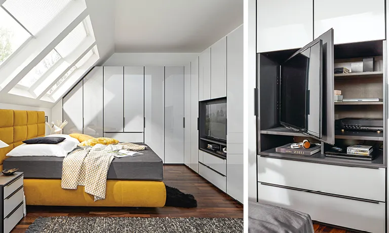 Schlafzimmer mit Dachschräge, Kleiderschrank unter Dachschräge, gelbes Boxspringbett