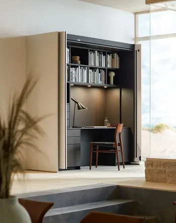 Das Pocketsystem von next125 gibt es nicht nur für die Küche, auch Büroschreibtische können so einfach versteckt werde. 