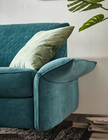 global-family-schlafsofa-melida-blau-armlehne-umgeklappt.jpg