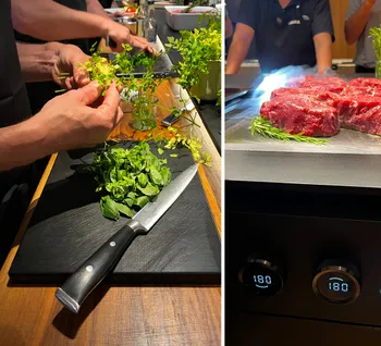 Frische Steaks und frisches Gemüse in der Zubereitung am Kochplatz in der Küche mit küchengeräte von BORA