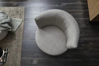 Grauer runder Sessel mit Boucle Bezug von oben.