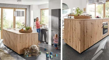Die Kücheninsel ist das Zentrum einer geräumigen Wohnküche.
