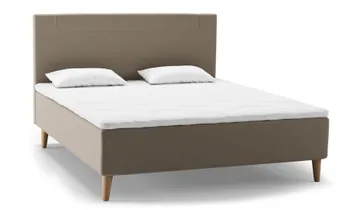 Ein stilvolles Svane® Zense Nordic Box Bett mit gepolstertem Kopfteil in sanftem Grau. Die Kombination aus minimalistischem skandinavischem Design und ergonomischem Schlafkomfort sorgt für eine perfekte Nachtruhe.