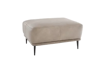Grauer Leder Hocker mit schwarzen filigranen Beinen. 