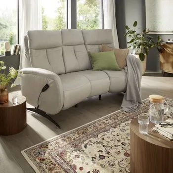 Beiges trapezförmiges Ledersofa mit hoher Rückenlehne.