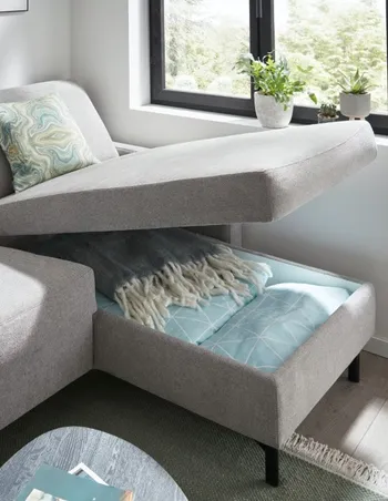global-family-schlafsofa-melida-mit-longchair-grau-und-stauraum.jpg